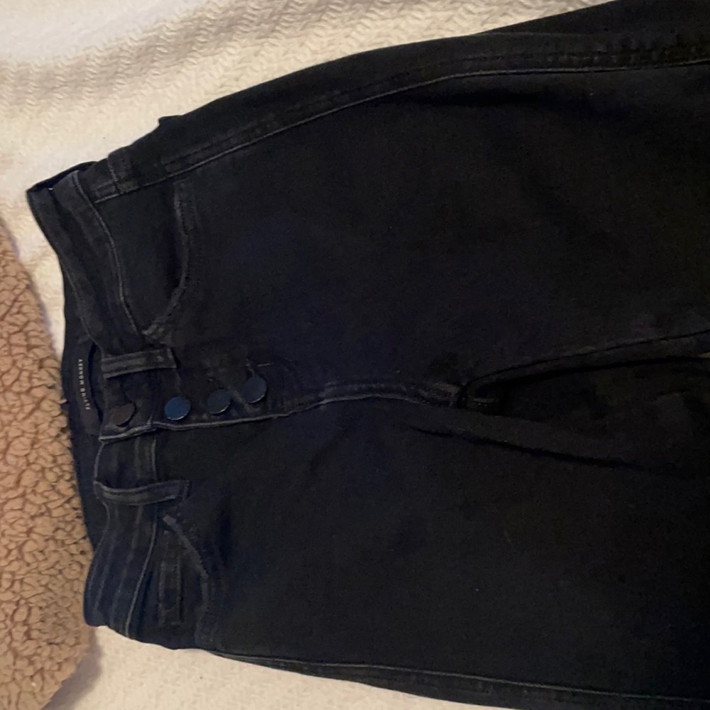 slightly distressed black bell bottom jeans